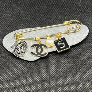 Gold and Black Iconic Inspired Brooch